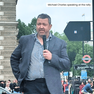  Michael Charles speaking at the rally